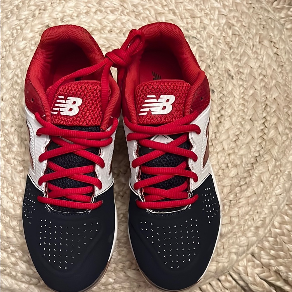 New Balance Red and Black  womens cleats size 5, new with box
